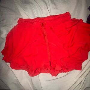 It’s flowey short with a built in tite short underneath them